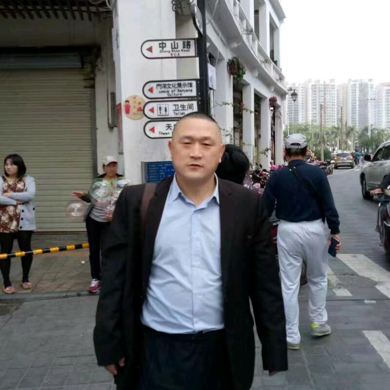 李三