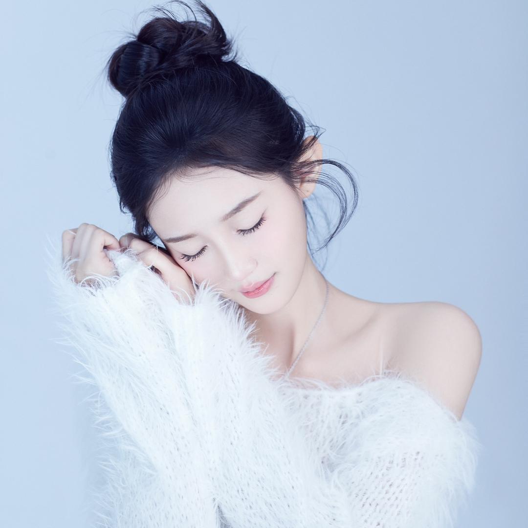 妍.