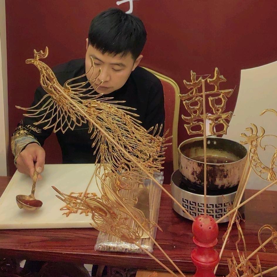 重庆糖画吹糖人 向星